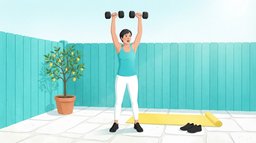 A woman in her forties presses two plain dumbbells overhead at the top of a thruster on a sunny backyard patio with a turquoise fence and a yellow mat, a classic metabolic conditioning move